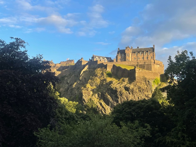A sunny view of Edinburgh Castle taken from a distance away