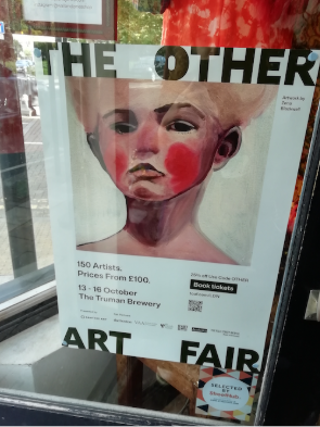 The Other Art Fair poster displayed in a Shoreditch shop window